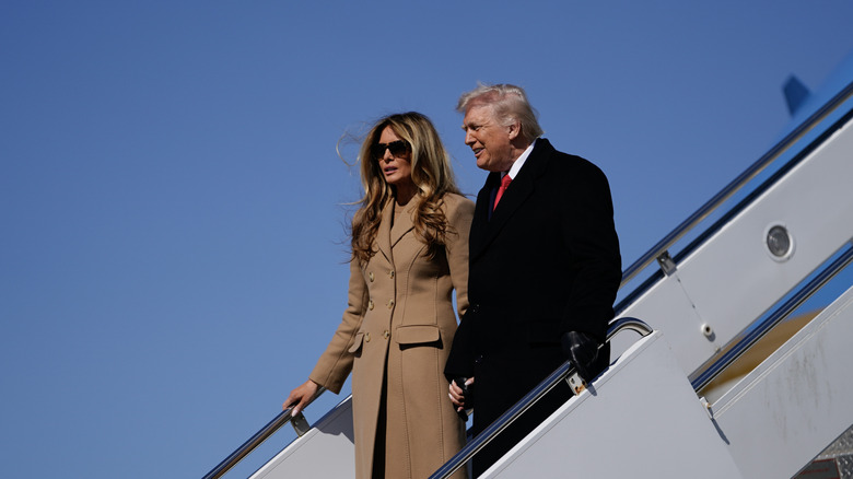Donald and Melania Trump exiting a plane