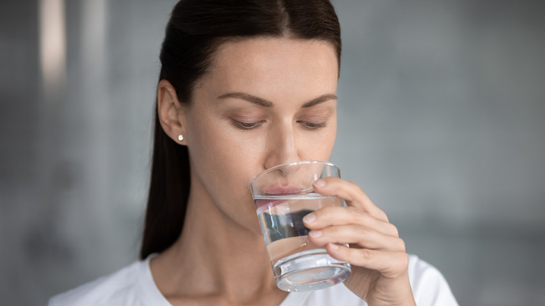 Woman drinking a glass of water