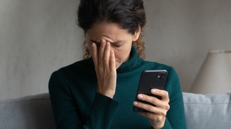 Woman having trouble focusing