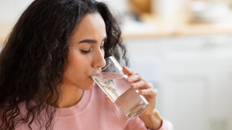 woman drinks water 