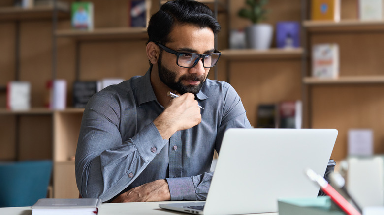 Person on computer looking for job
