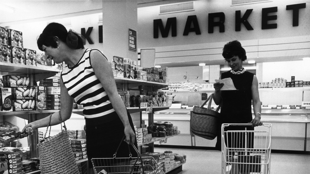 Women shopping at supermarket in the 1970s