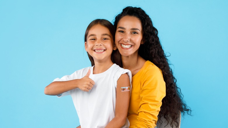 mother and child with bandage