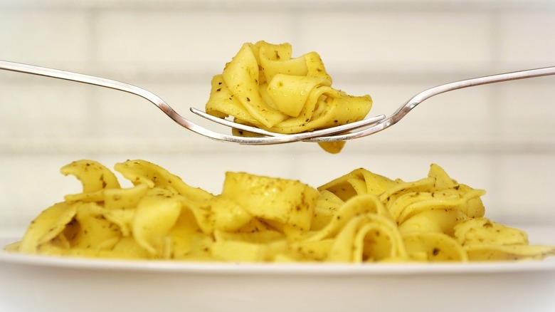 Bowl of pasta and forks