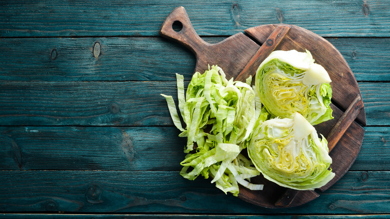 Iceberg lettuce on a wooden board