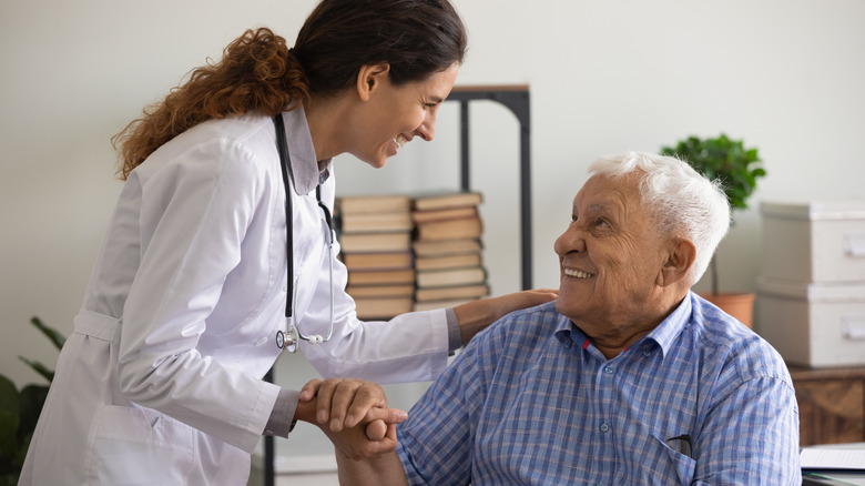 A doctor treats a patient