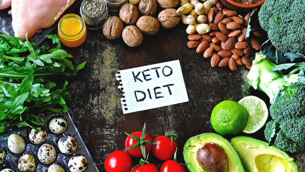 'keto' sign surrounded by foods