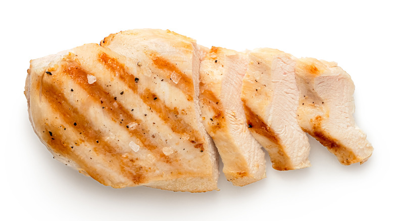 partly sliced cooked chicken breast