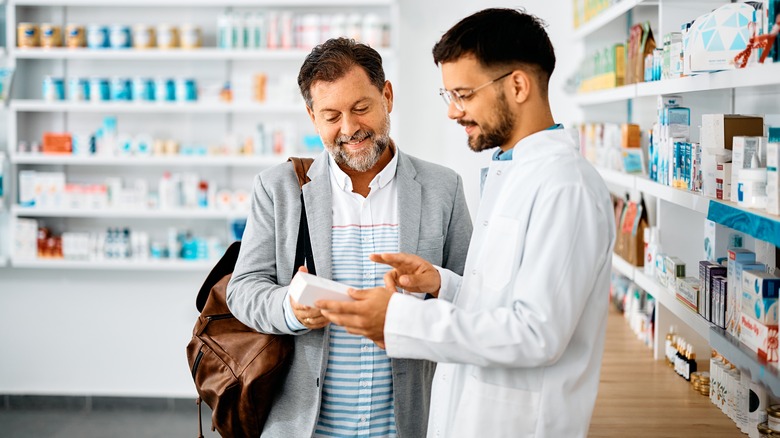 pharmacist with customer