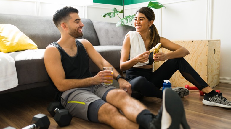Couple eating a snack before working out