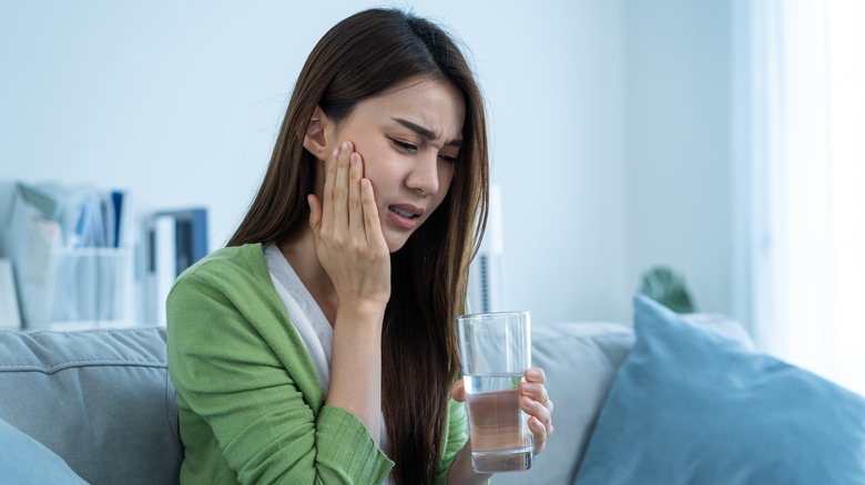 woman with tooth pain
