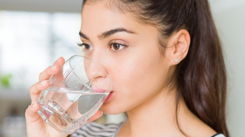 Woman drinking a glass of water