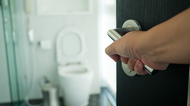 man going to the restroom