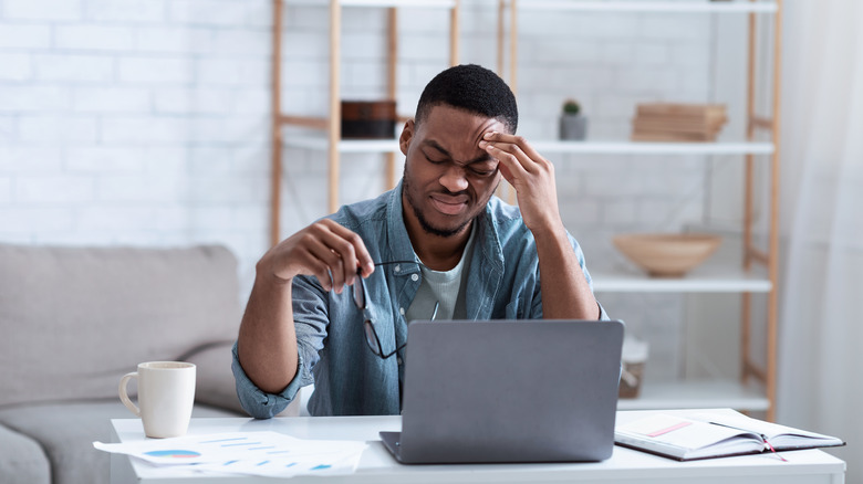 a man with a migraine
