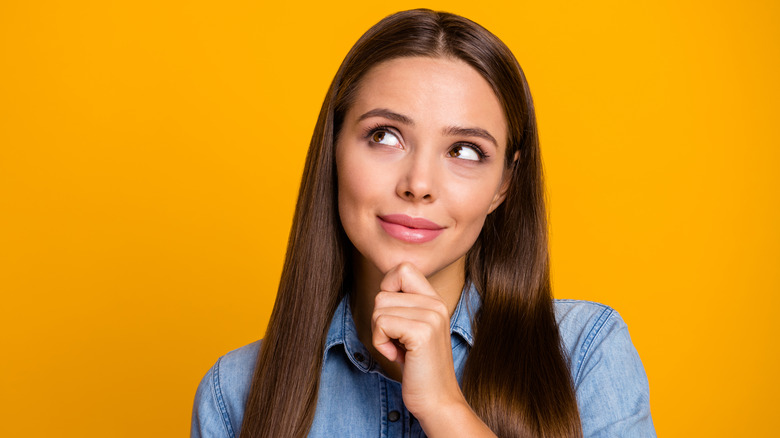 young woman thinking