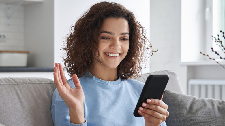 Teenager looking at her phone
