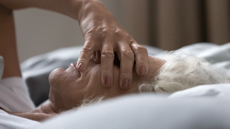 older woman having trouble sleeping