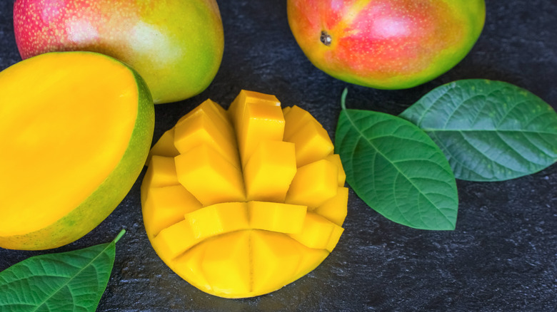 A cut-up mango on a table