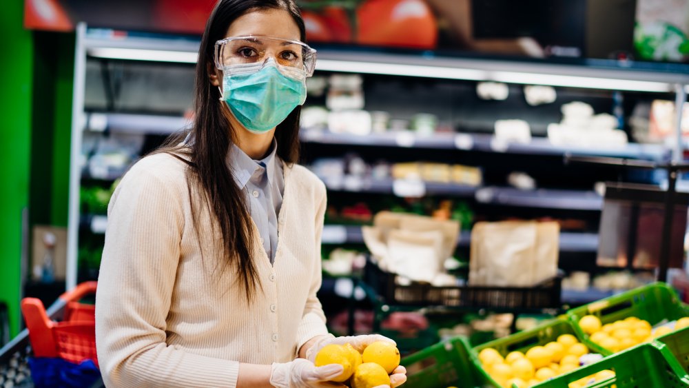 Woman buying produce