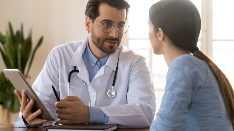 Doctor with patient during a checkup