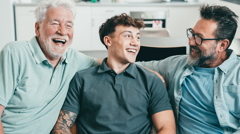 three men representing multigenerational family