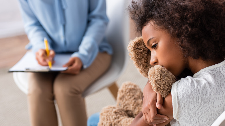 Young girl at therapist appointment