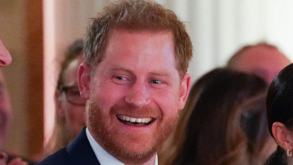 A smiling Prince Harry