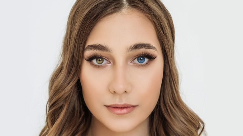 Woman with two different colored eyes