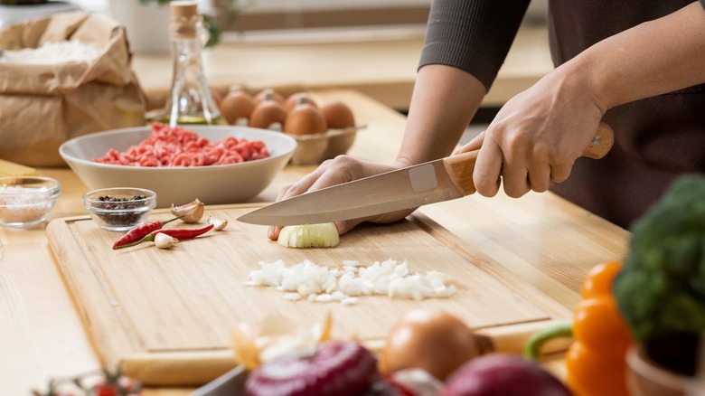 Woman chopping onions 