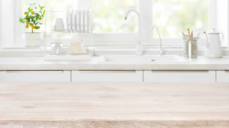 clean white counter and sink area