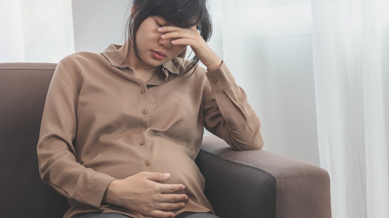 pregnant woman feeling stressed
