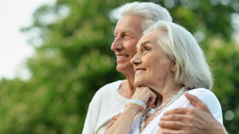 couple smiling showing off teeth