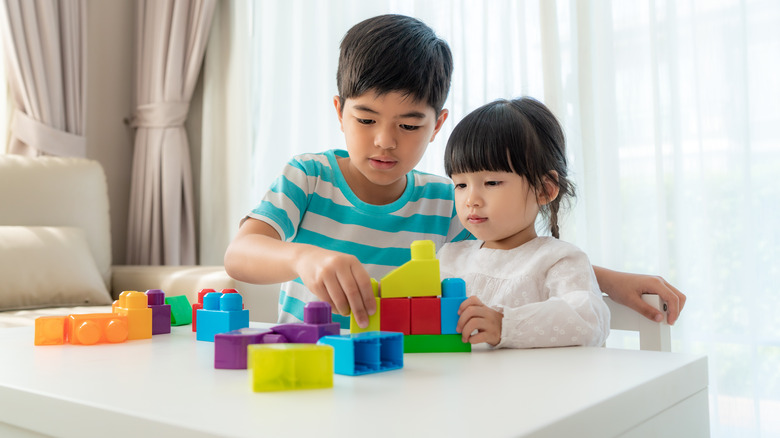 Siblings playing together