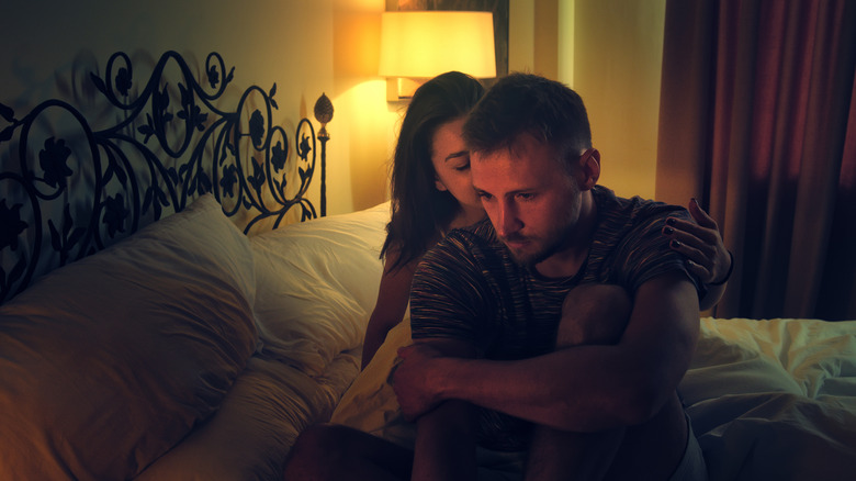 Man sitting in bed