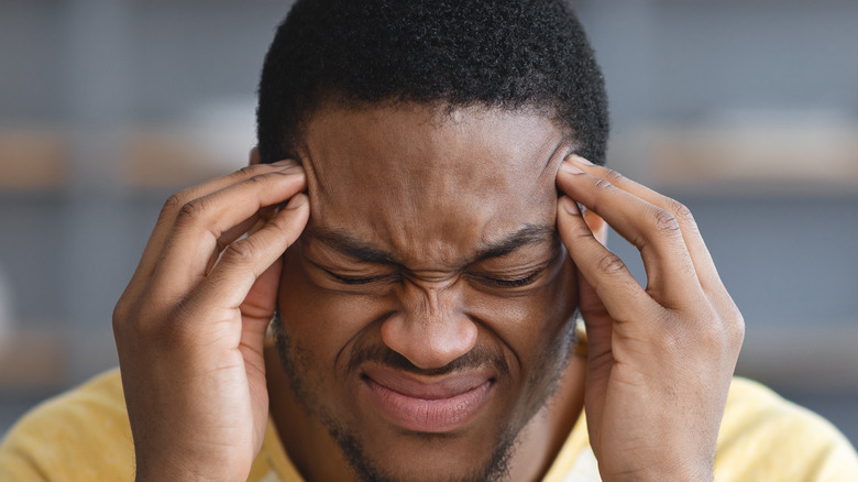 man having headache