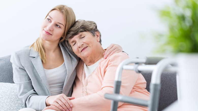 woman hugging older woman