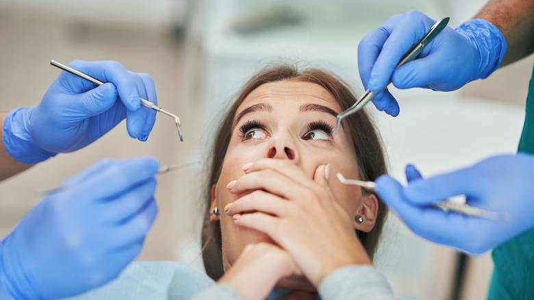 Woman scared at the dentist
