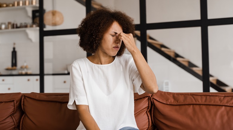 Woman with sinus headache