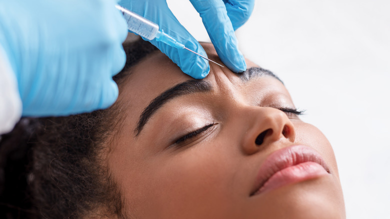 black woman getting botox injections