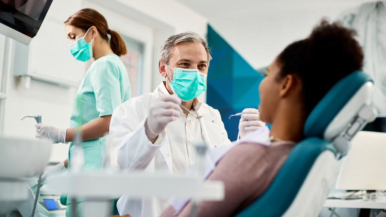 denist with patient