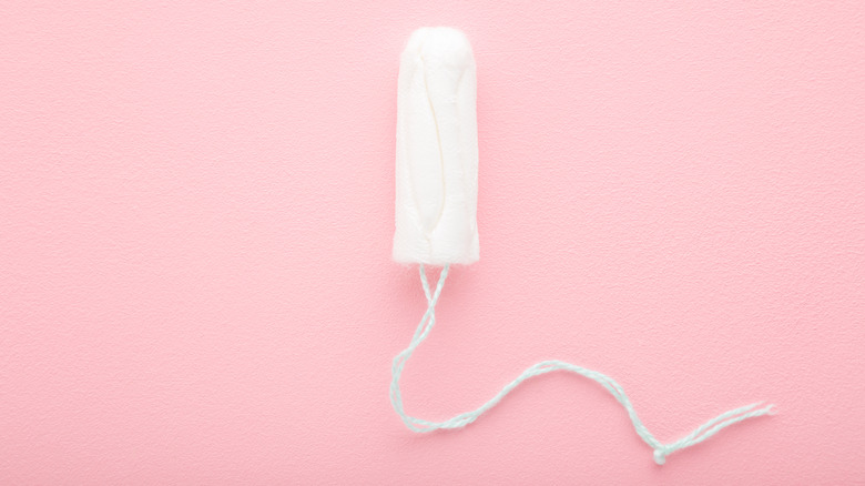 tampon against pink background