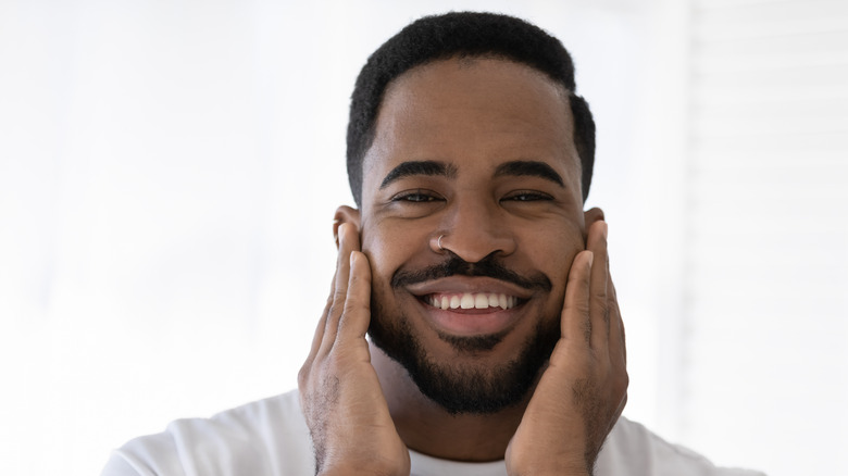 Man with beard smiling