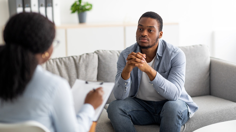 black man talking to a black therapist