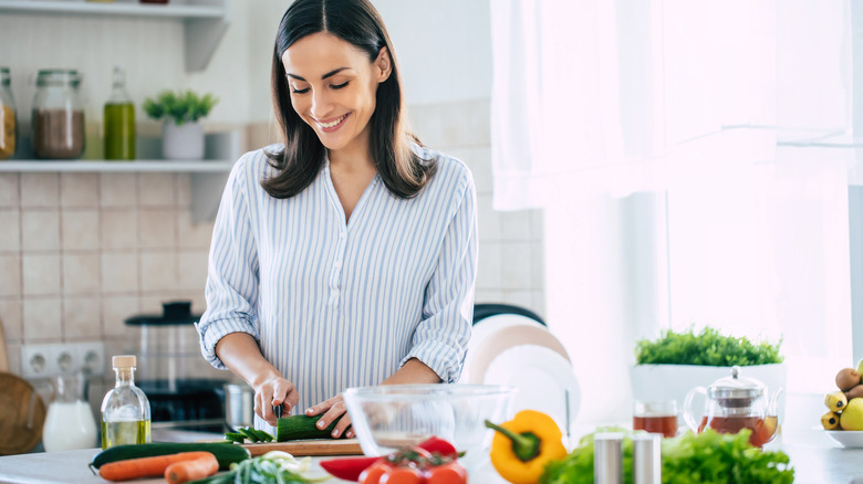 a woman making a vegan meal