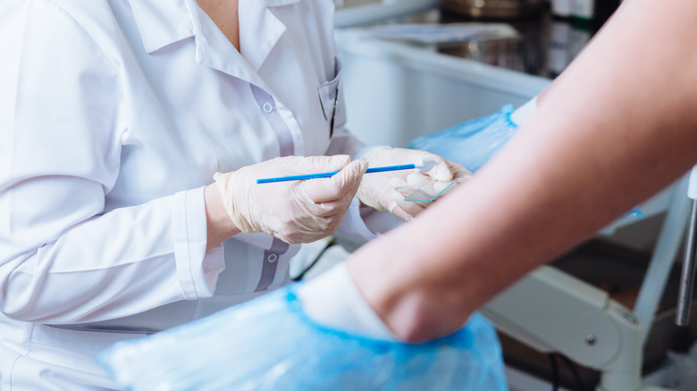 Doctor and patient preparing for OBGYN exam