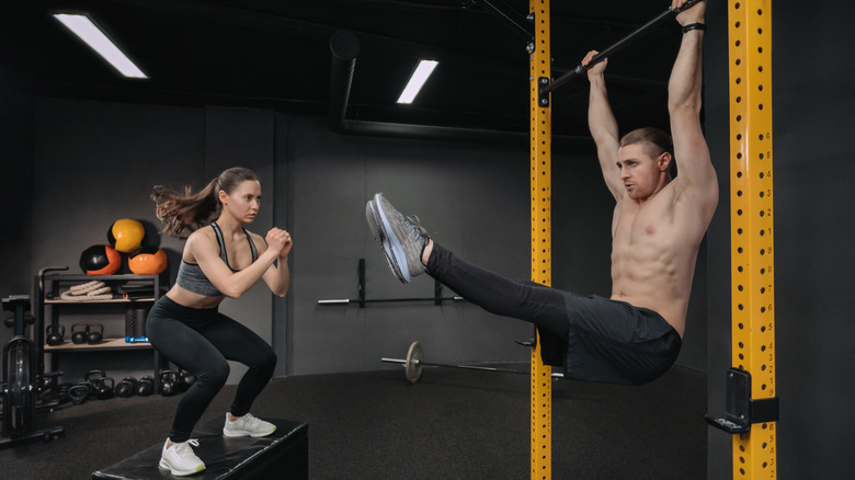 woman and man doing circuit training