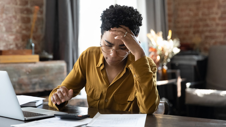 Stressed person working at desk