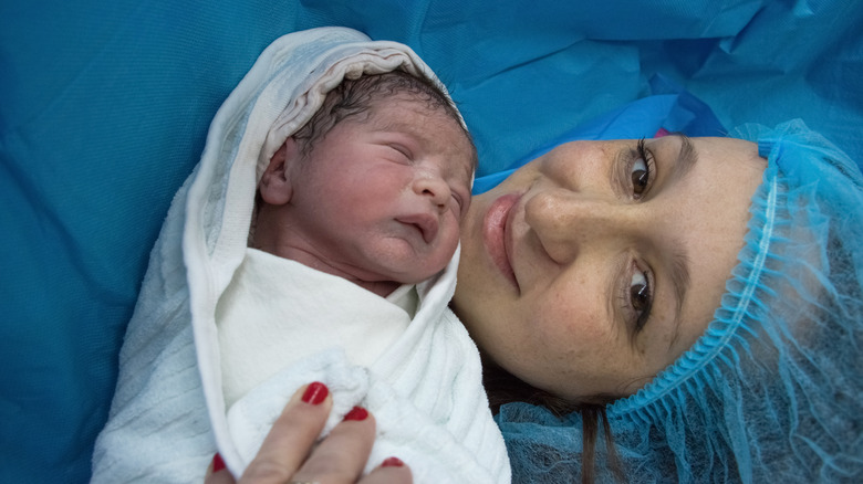Baby with mother in hospital