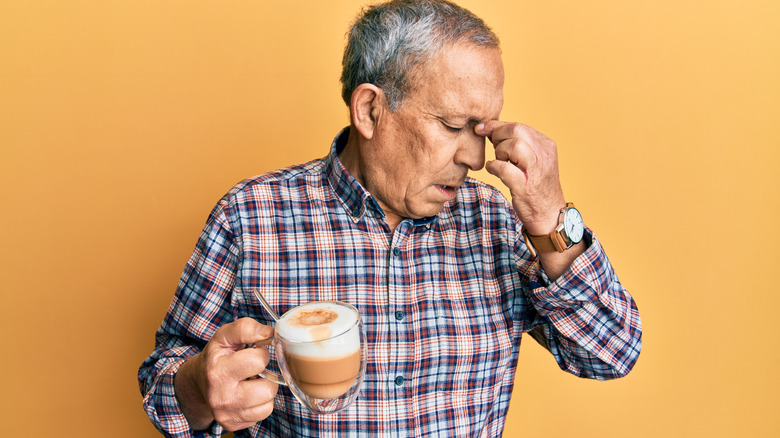 Older man with caffeine headache