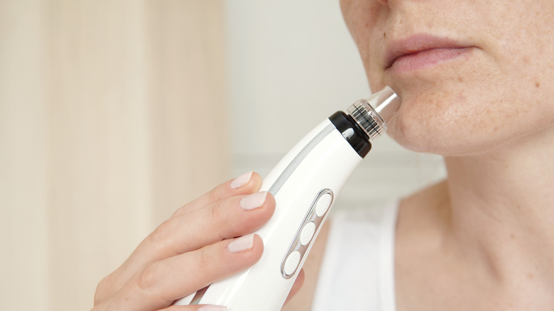 Women using pore vacuum